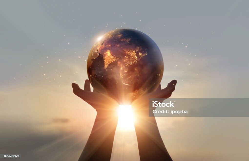Earth at night was holding in human hands. Earth day. Energy saving concept, Elements of this image furnished by NASA https://www.nasa.gov/specials/blackmarble/media/BlackMarble_2016_Asia_composite.png