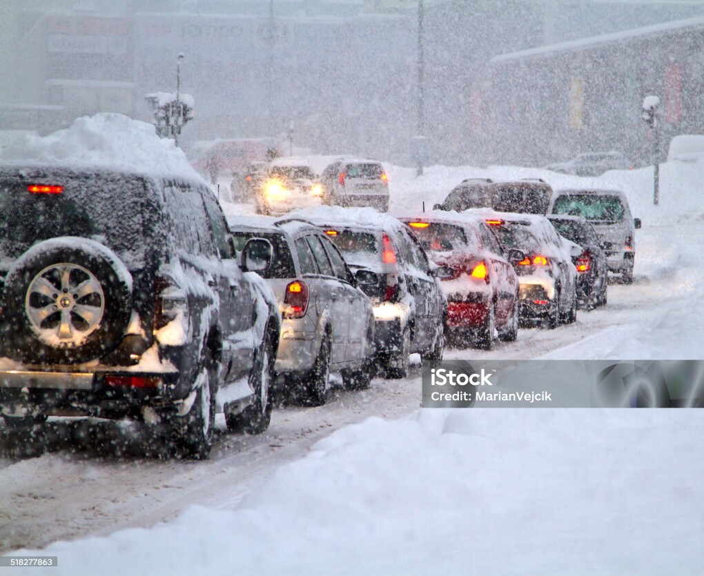 Blizzard on the road. Photo taken 07. februar 2013 in Slovakia Europe town Liptovsky Mikulas. Heavy snowfall paralyzed traffic for several hours.