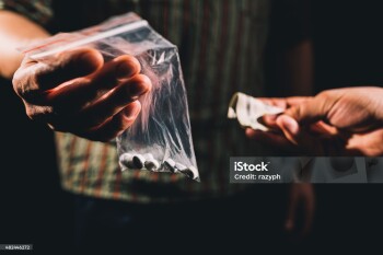 Dealer selling cocaine,ecstasy or other illegal drugs