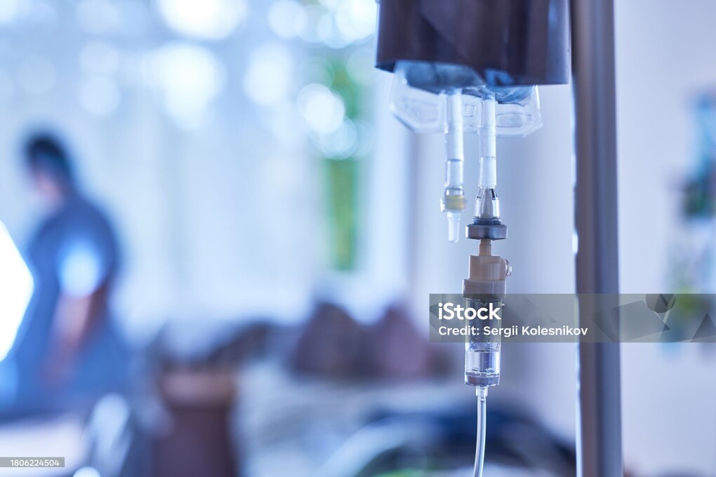 IV on the background of a hospital room, selective focus