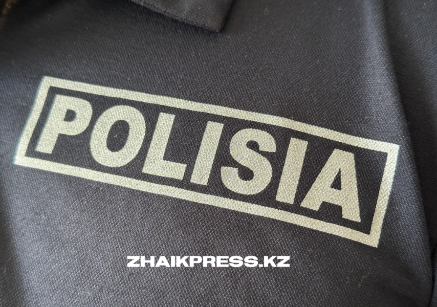 Олар полицейді ұрады.