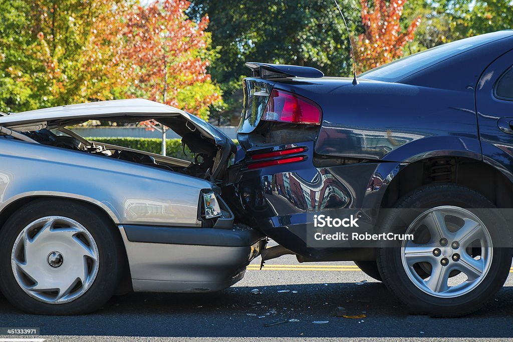 Auto accident involving two cars on a city street