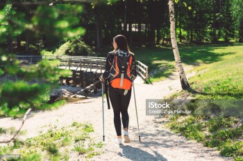 Young woman hiking in the mountains