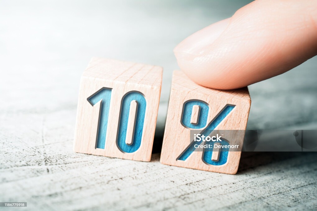 10 Percent Sale Discount Formed By Wooden Blocks And Arranged By Female Finger On A Table