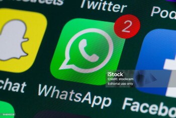 London, UK - July 31, 2018: The buttons of WhatsApp, Facebook, Twitter and other apps on the screen of an iPhone.