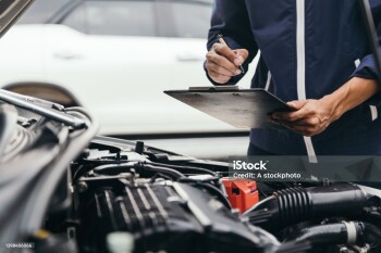 Automobile mechanic repairman hands repairing a car engine automotive workshop with a wrench, car service and maintenance,Repair service.