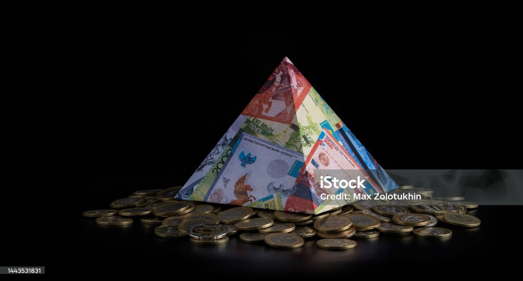 Pyramid with the image of Kazakhstani banknotes - tenge and Kazakhstani coins