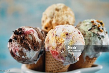 Pistachio, Chocolate, Strawberry and Vanilla Ice Cream in a Cone