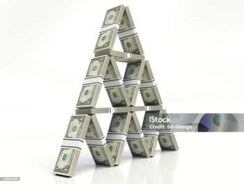 American dollar bills. house of cards, stacked notes on a white background