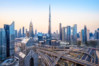 the skyline of dubai during sunrise