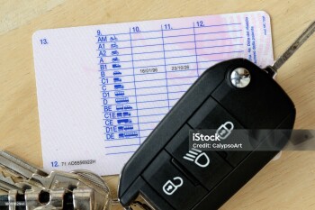 Driving license with car key