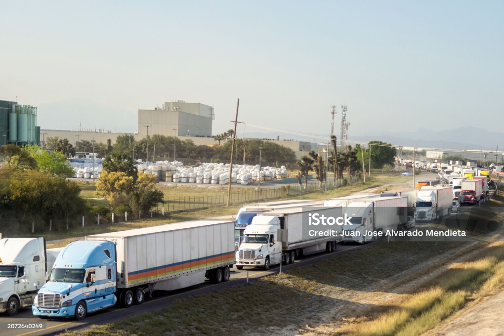 Group of trailers stuck in traffic on a highway