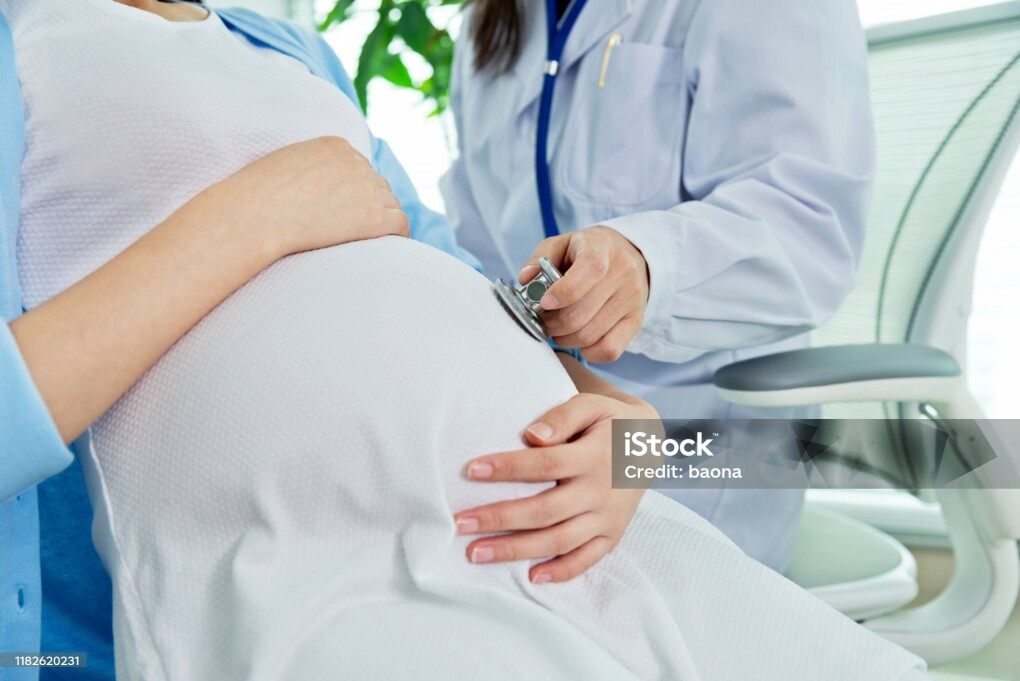 Doctor examining a pregnant woman