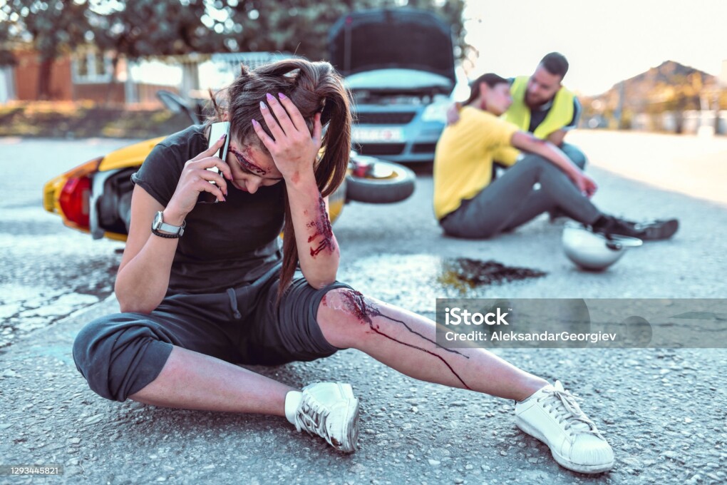 Female Calling Ambulance While Injured In Car Accident