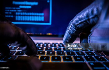 Payments System Hacking. Online Credit Cards Payment Security Concept. Hacker in Black Gloves Hacking the System.