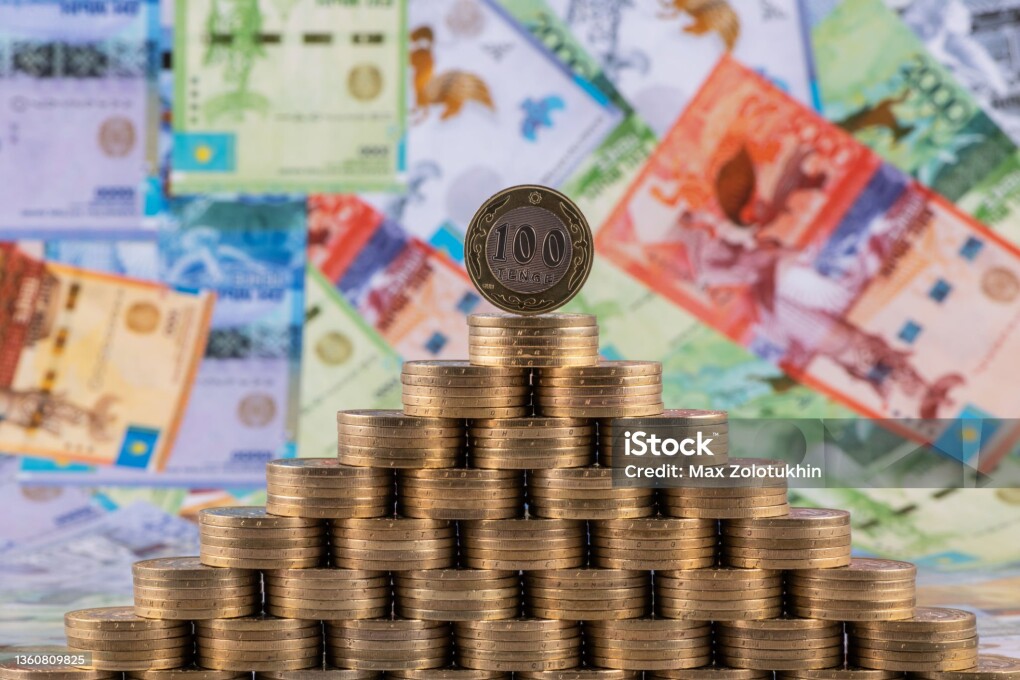 100 Kazakhstani tenge coins stacked in the form of a pyramid