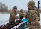 Молодому пополнению Национальной гвардии вручили боевое оружие