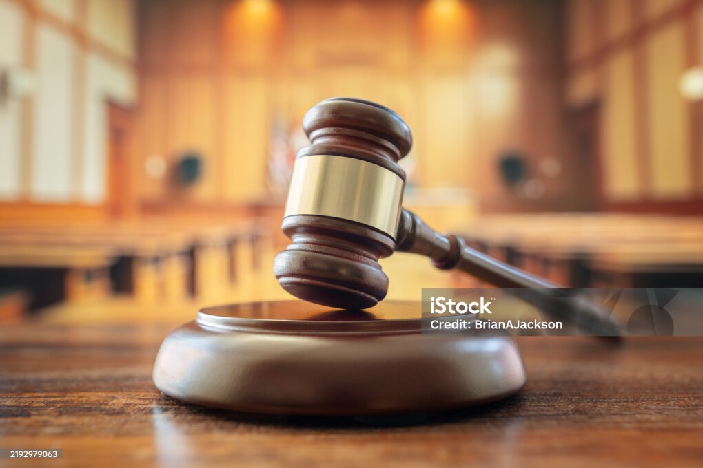 Judges gavel in court room legal trial and law background