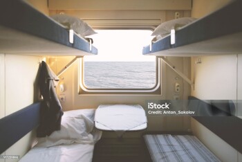 Sea view from train window. Focus on a sea.