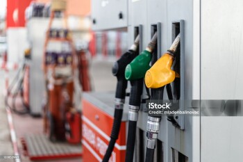 Details from gas station. Gasoline pistols close up shot.