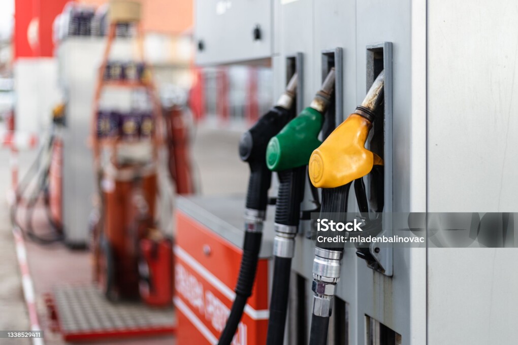 Details from gas station. Gasoline pistols close up shot.