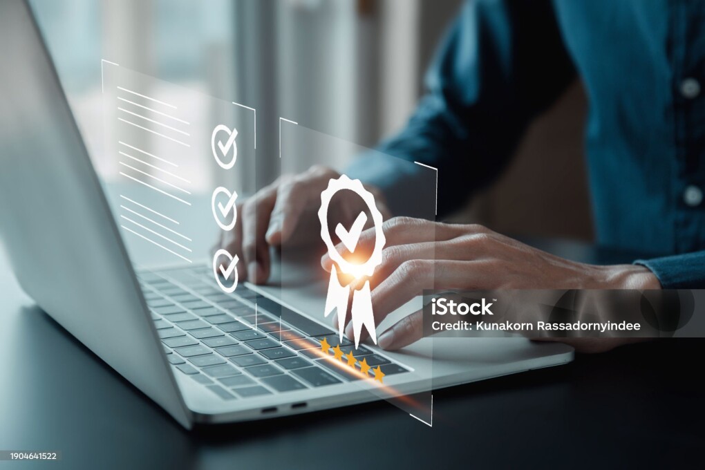 The company's product quality certificate is compliant, the check mark symbol represents the standard quality control. Certification and standardization process, iso certified business, conformity to international standards and quality assurance concept.
