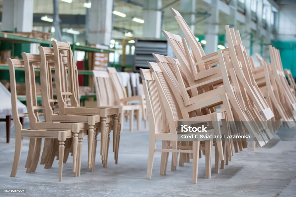 Furniture production from a natural tree. Production of chairs at the factory.
