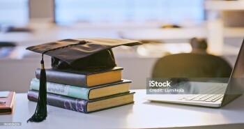 Graduation cap, books and laptop or university education for future goal, scholarship or online. Studying, research and thesis proposal for final school project for learning course, report or student