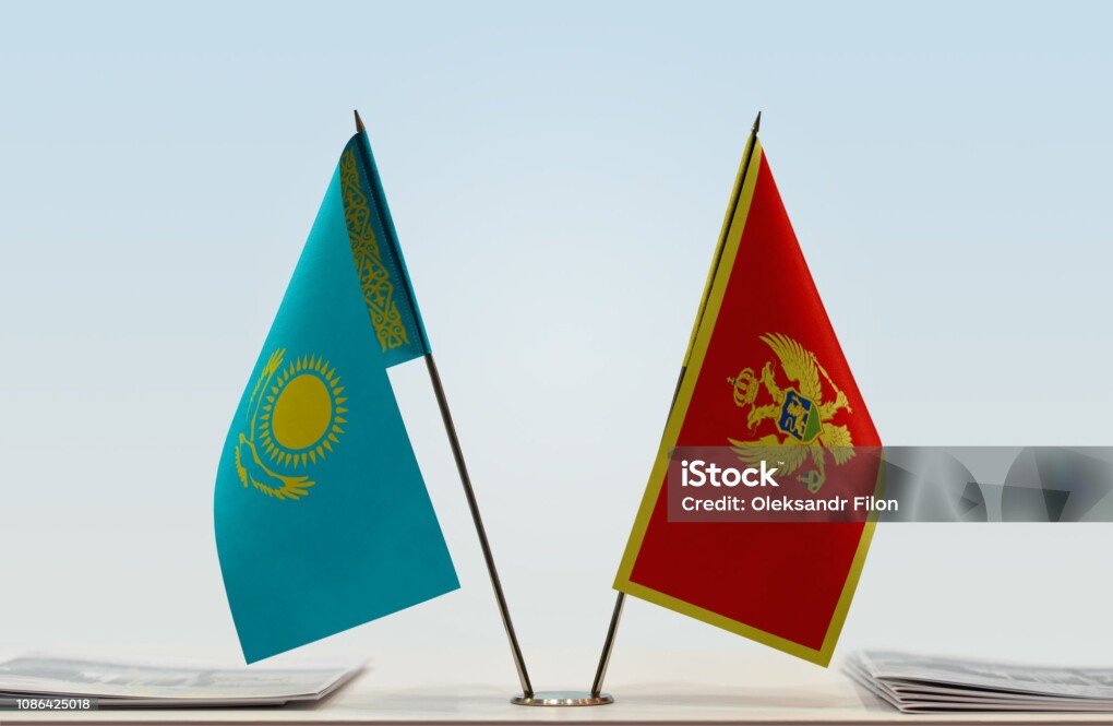 Two table flags of Kazakhstan and Montenegro