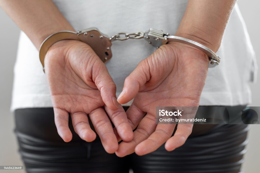 Criminal wearing handcuffs