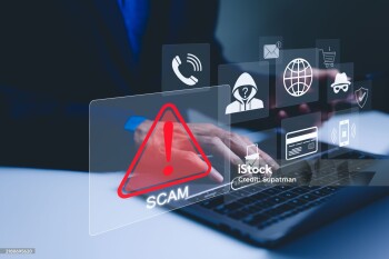 Scam Alert Warning with Cybersecurity Icons. A person using laptop, warning sign for scams with icons representing online threats, phishing, and cybersecurity. Unknown person, suspicious scammer,