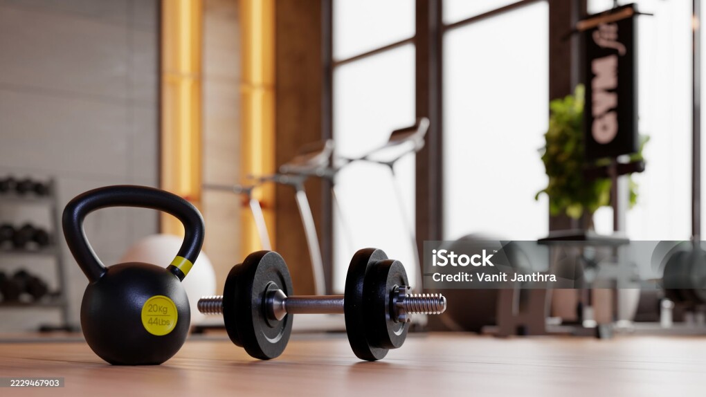 Kettlebell and dumbbell in modern gym- 3D rendering