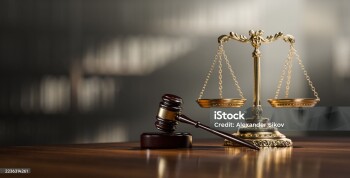 Legal concept: Scales of justice and and the judge's gavel hammer as a symbol of law and order.