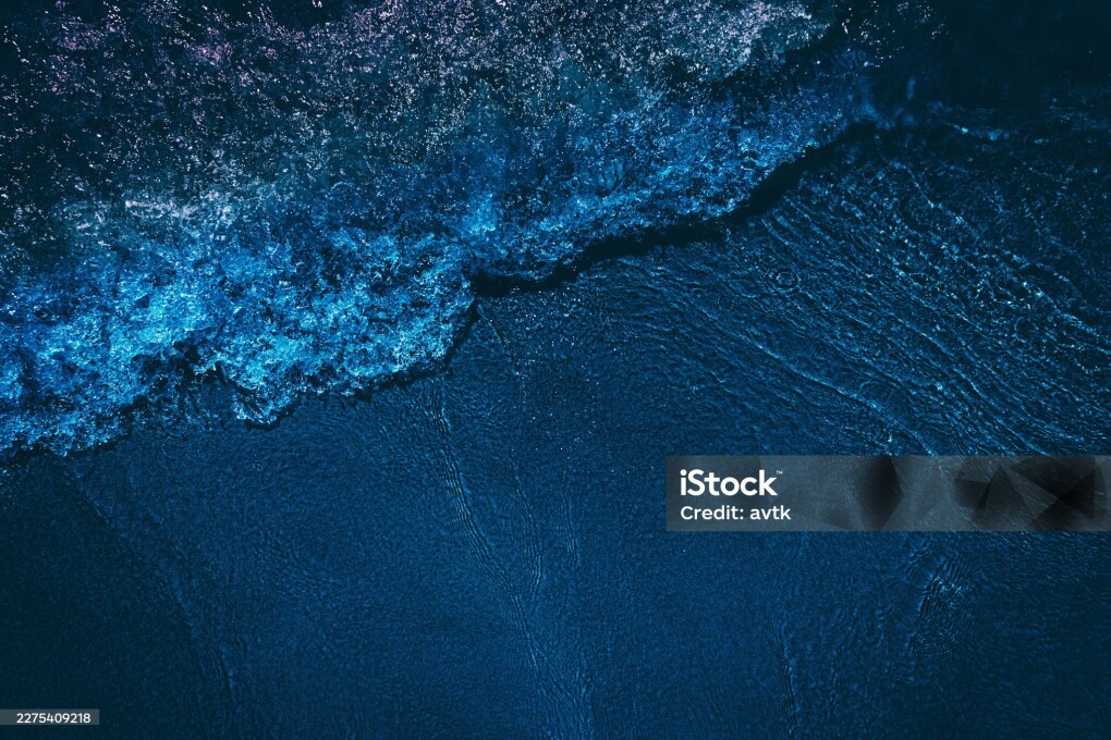 dark navy blue wave seawater, closeup, topview, copyspace for text