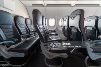Airplane seats and windows. Economy class comfortable seats without passengers. New low-cost carrier airline