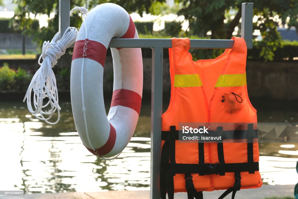 safety buoy and lifeguard equipment on the river bank