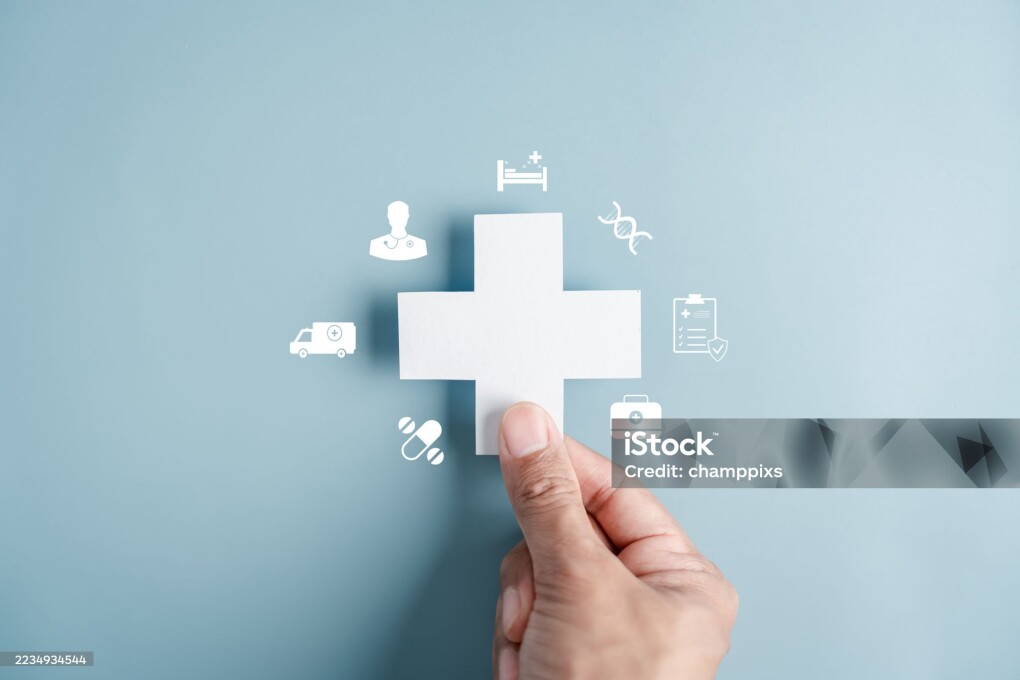 Healthcare insurance and medical coverage concept. white medical cross health protection, treatment access, and reliable healthcare services.