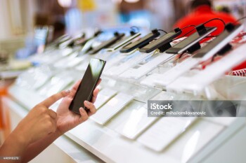 Buying smartphone in an electronics store