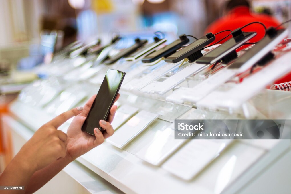 Buying smartphone in an electronics store