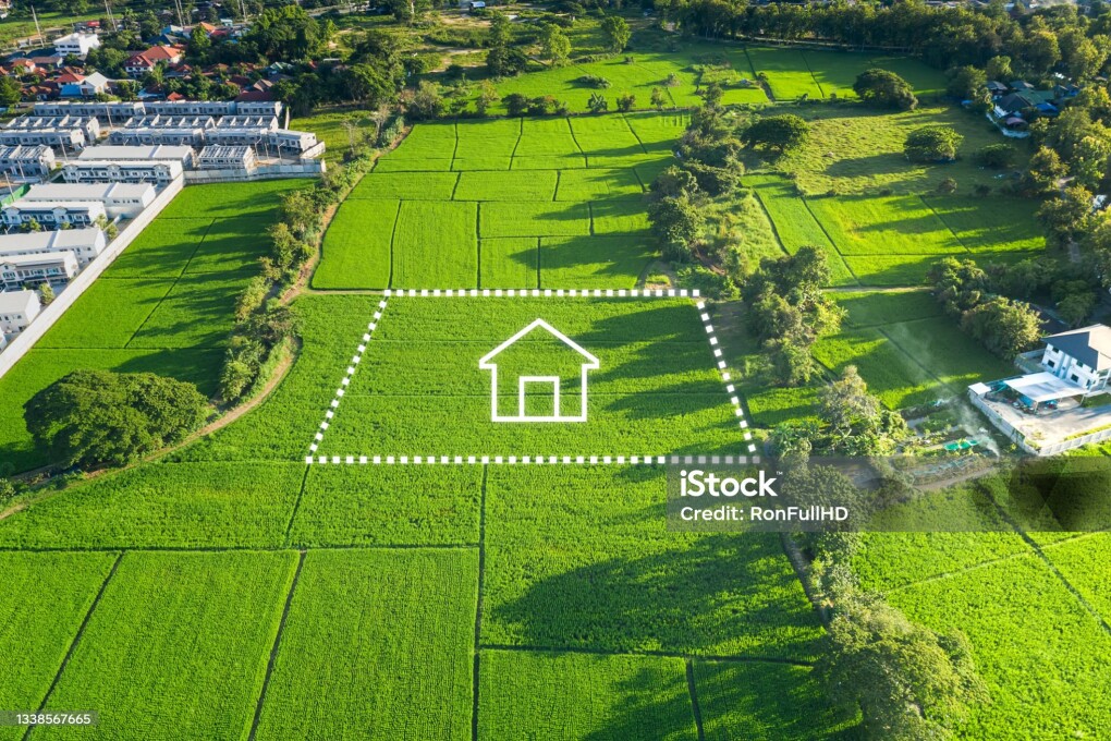Land or landscape of green field in aerial view or bird eye view. Include agriculture farm, icon of residential, home or house building and land plot. That real estate or property for dream concept to build, construction, owned, sale, rent, buy, purchase, mortgage and investment in Chiang Mai of Thailand.