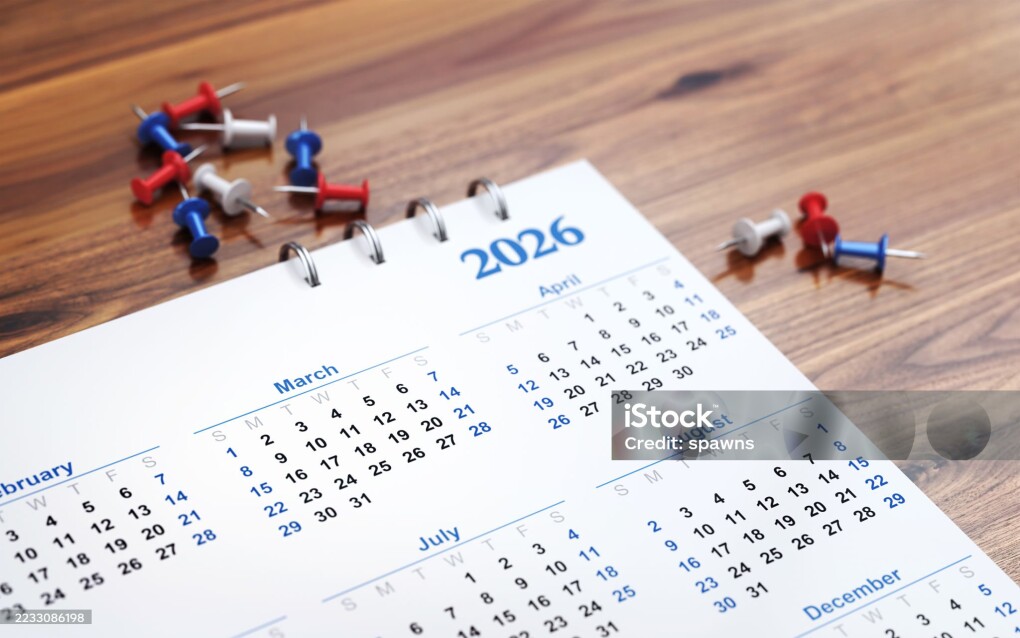 3d render March 2026 Calendar Stands on Wooden Background with Colorful Pushpins, Christmas and New Year Concept