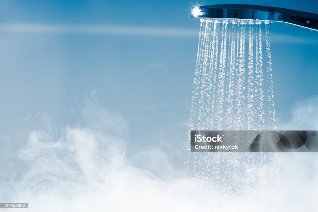 shower with flowing water and steam