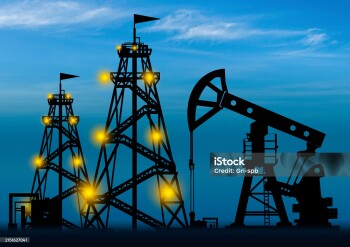 Oil and gas sector. Oil pump silhouette on sky background. Concept - petroleum exploration. Drilling rigs glow at night. Search for oil fields. Concept - petroleum production corporation.