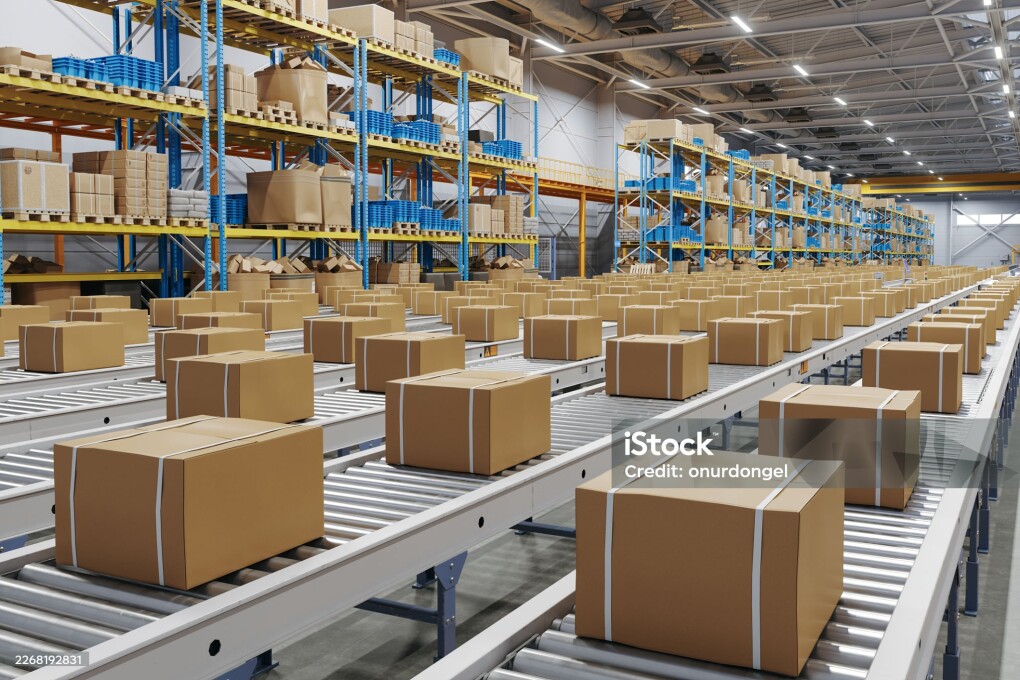 Automated Warehouse Conveyor System with Cardboard Boxes in Distribution Center