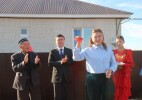 Сырым ауданында  көпбалалы төрт отбасына  жаңа баспана берілді