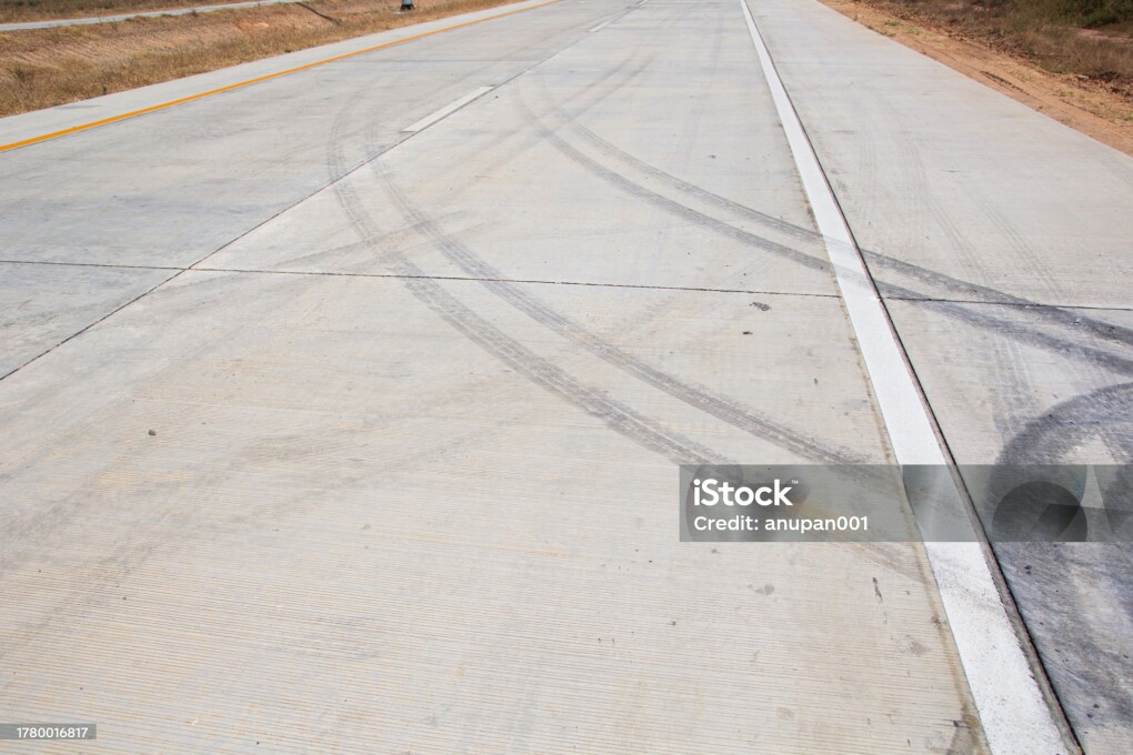Abstract road background with tracks of tires.