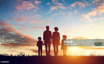 Happy family together at sunset. Parents with their children.