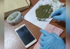 Телефон и вещество, похожее на насвай, пытались перебросить в учреждение УИС ЗКО